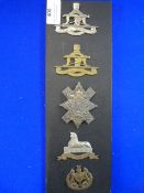 Five Army Cap Badges