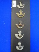 Five Light Infantry Cap Badges