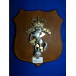 Brass Reme Plaque on Wood 23cm high