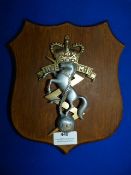 Brass Reme Plaque on Wood 23cm high
