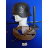 Repainted WWII German Helmet in Relic Condition, with Replacement Liner