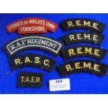 Eight Various Cloth Shoulder Tags