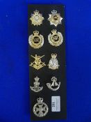 Nine Assorted British Cap Badges