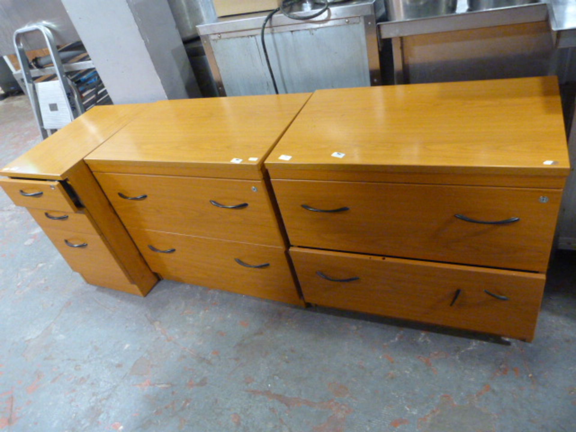 Two Sets of Office Drawers and a Three Drawer Fili