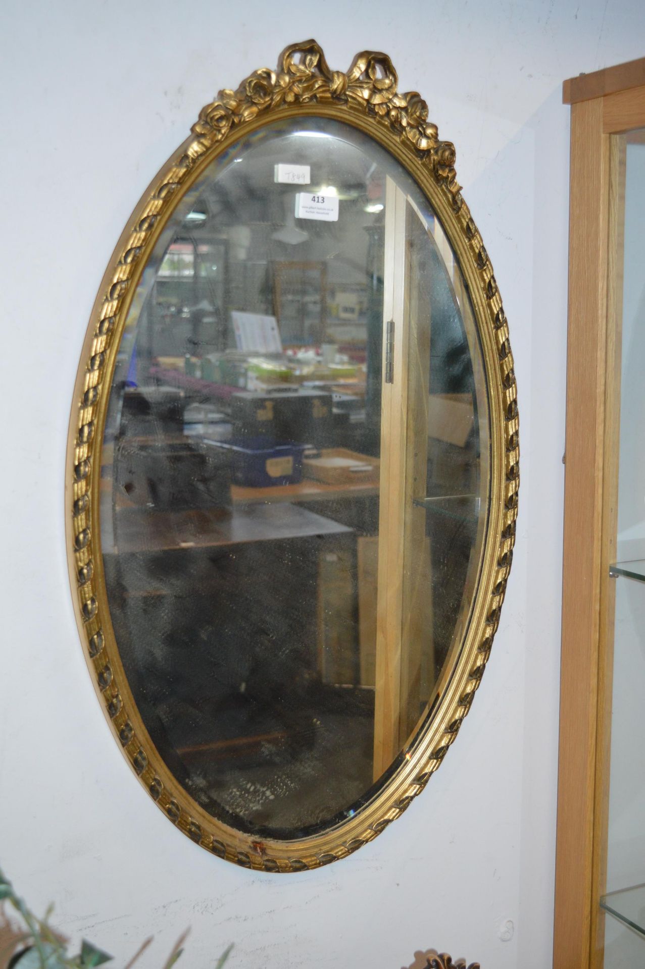 Gilt Framed Beveled Edge Oval Mirror