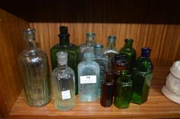 Thirteen Vintage and Antique Glass Bottles - Conpo, Fennings, Kilmers, etc.