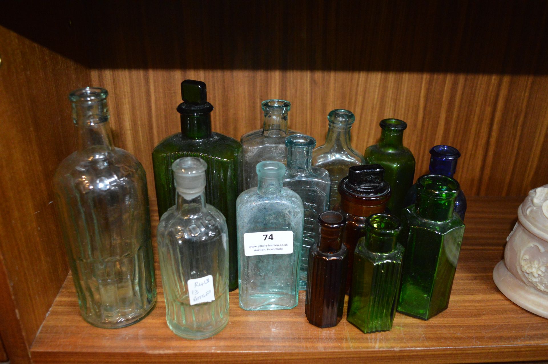 Thirteen Vintage and Antique Glass Bottles - Conpo, Fennings, Kilmers, etc.