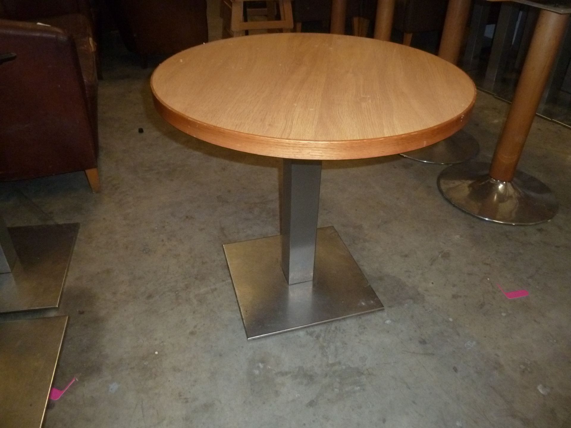* 5 x round tables S/S square pedestal bases with wooden vaner tops. 700 diameter x 660h