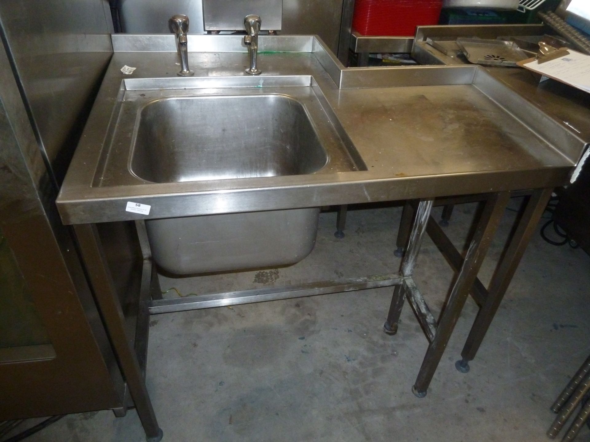 * S/S sink with taps with rear cut out. 1010w x 770d x 900h