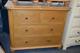 Light Oak Two over Two Chest of Drawers