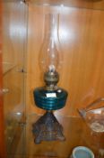 Oil Lamp with Cast Iron Base and Turquoise Glass