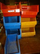 Seven Plastic Storage Bins