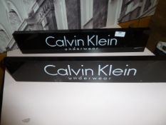 * 2 x Calvin Klein underwear branded signs