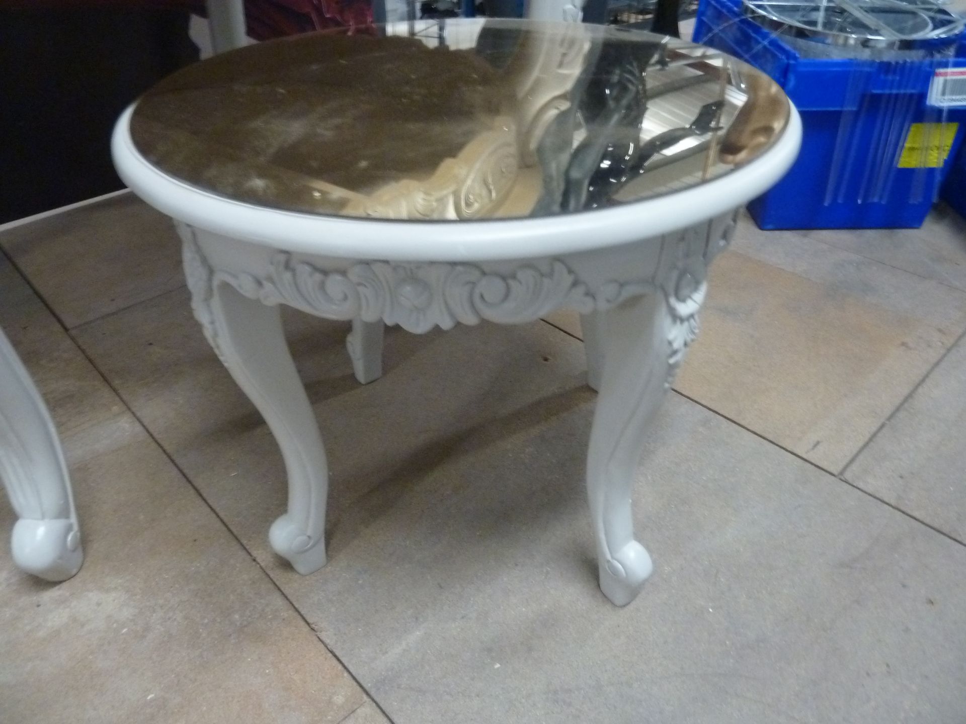 * Small cream table with ornate legs, removable gold mirrored perspex top 600d x 500h