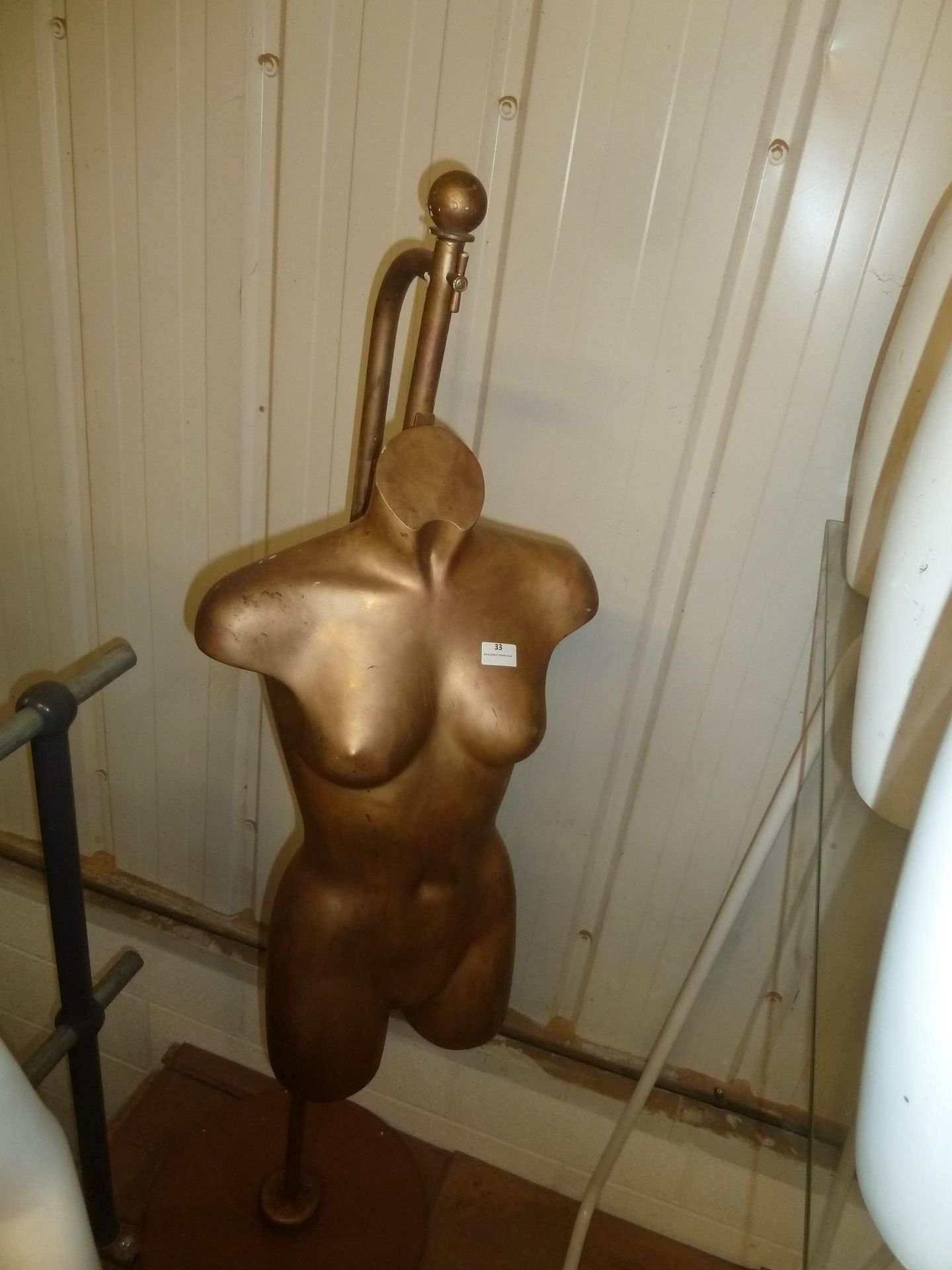 * rustic gold hanging mannequin