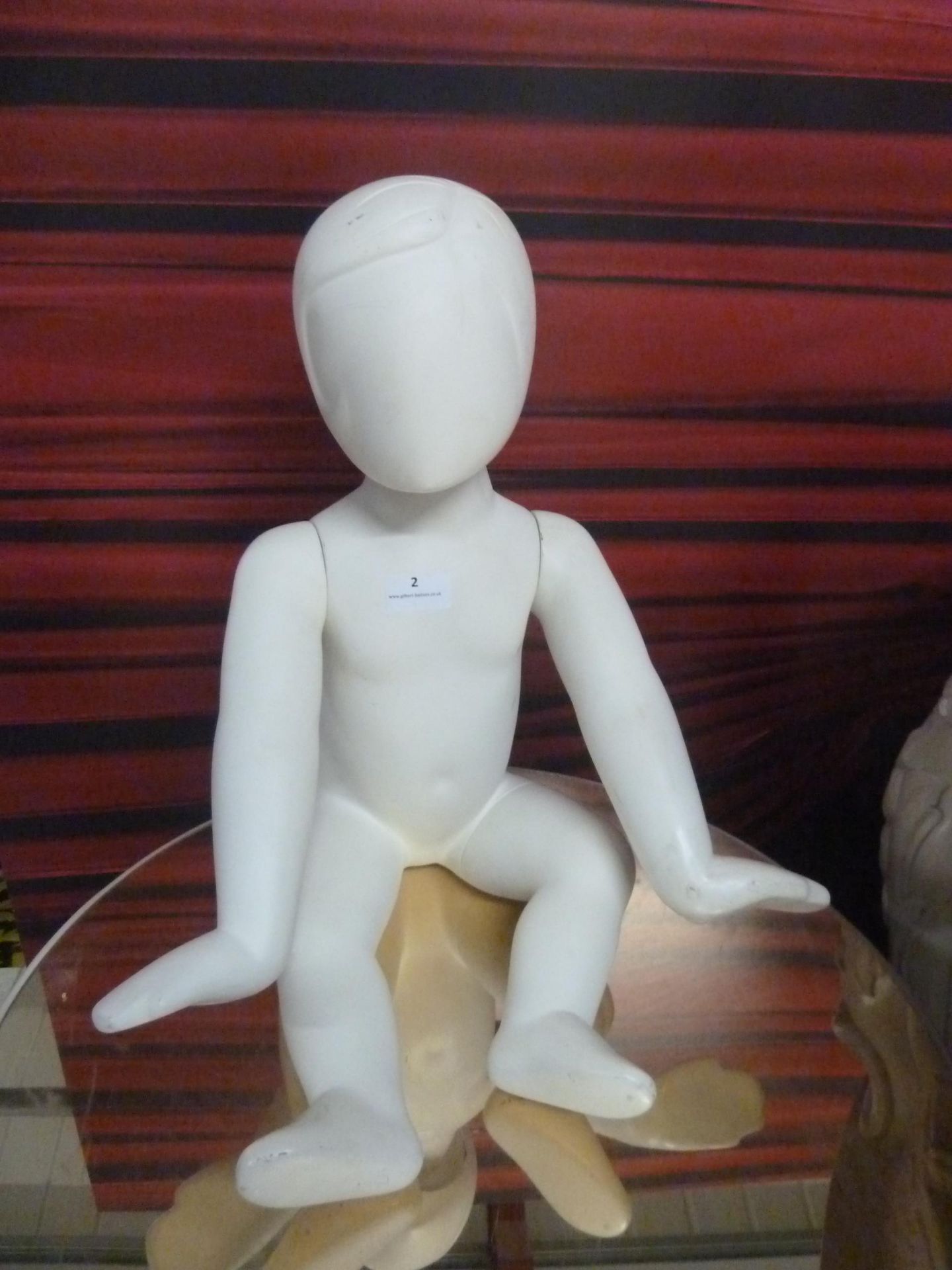 * toddler mannequin - seated (small crack to rear)