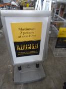 * external poster stand with wheeled base - suitable for weighting with water or sand