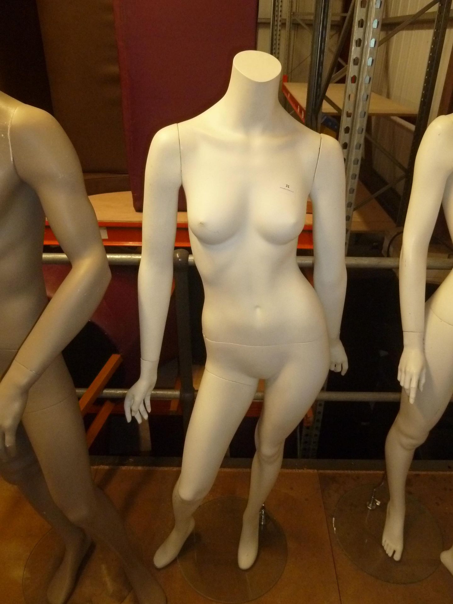 * female mannequin with glass base