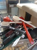 * large quantity of utensils - including ladles, tongs, whisk, peeler, etc.