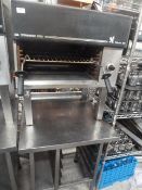 * Falcon Steakhouse Grill - gas - mounted on S/S table with racking and undershelf. 700w x 800d x