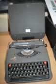 Empire Aristocrat Portable Typewriter in Carry Case