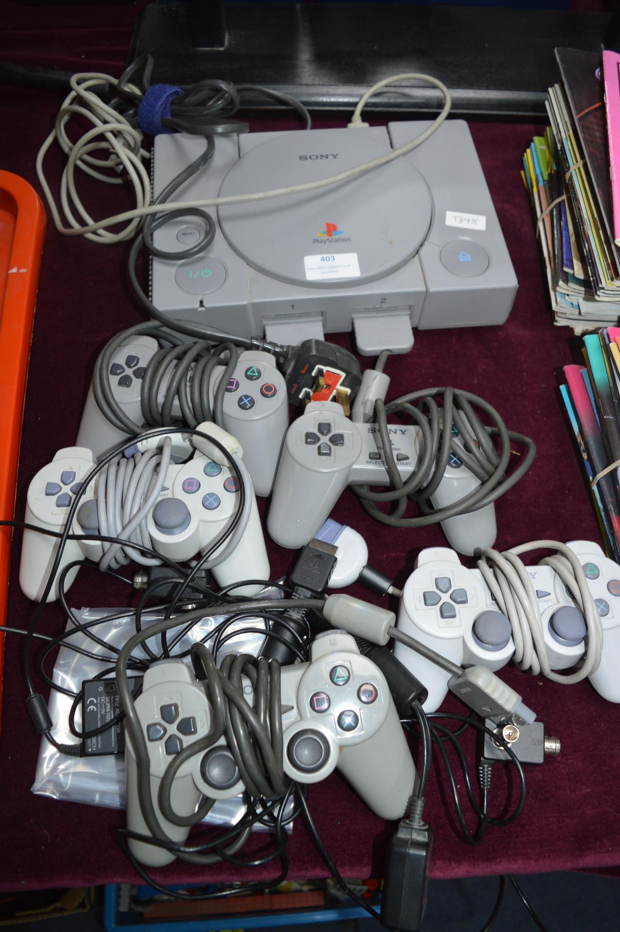 Sony PlayStation and Five Controllers
