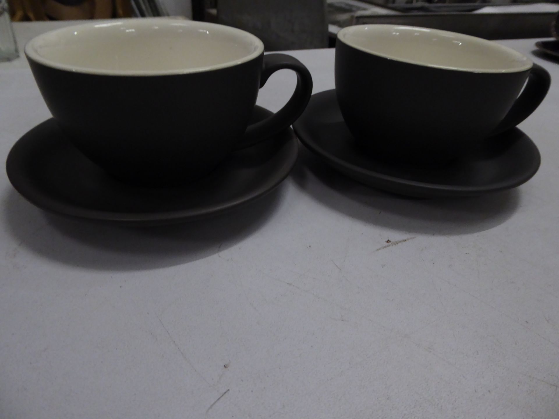 *24 x grey 'slate' mugs with cream interior with saucers