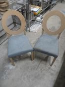 * 12x chairs with oval cut out and blue upholstory