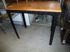 * wooden topped tall table with black metal riveted legs. 1200w x 700d x 1100h
