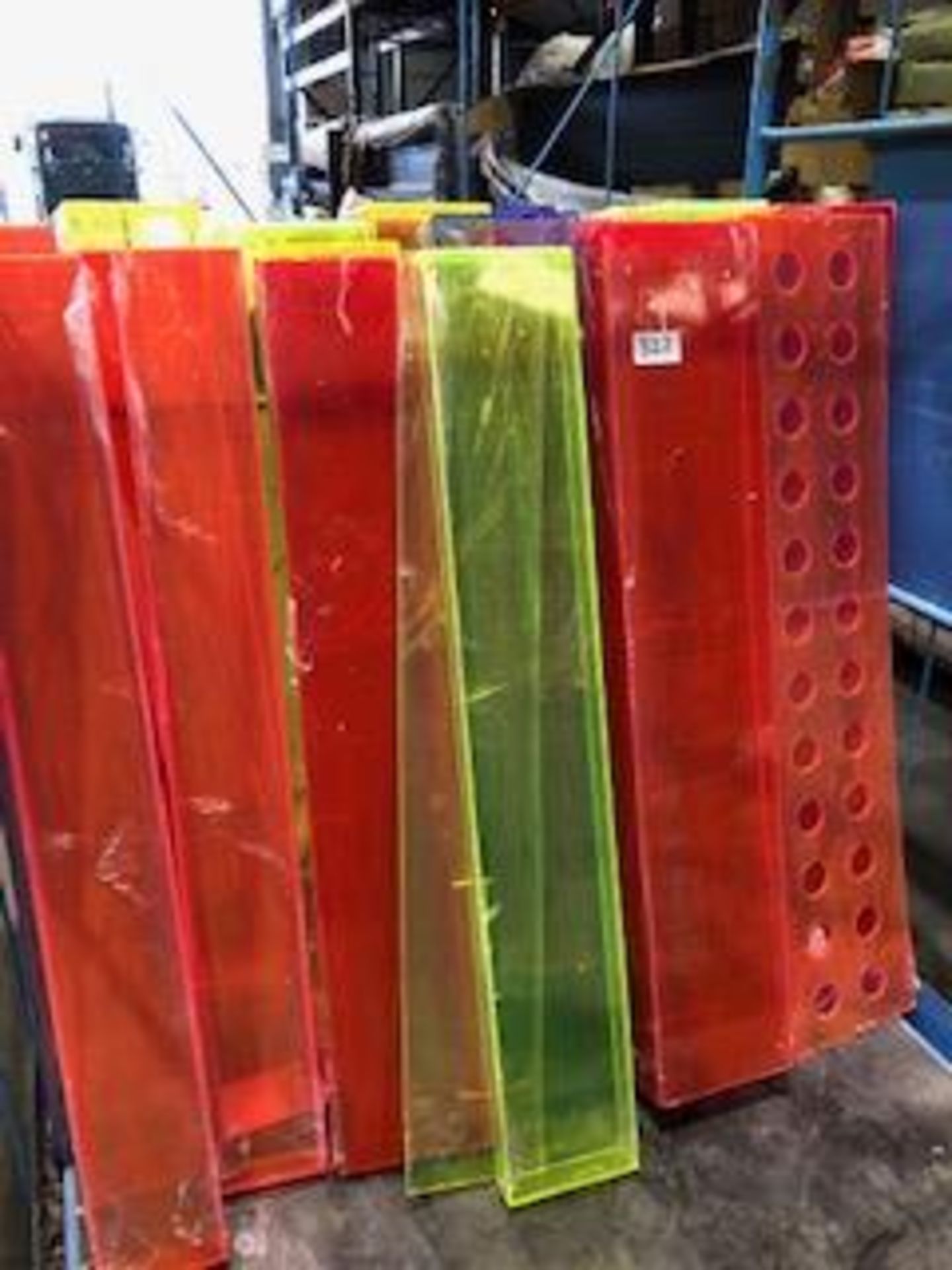 *  job lot of 25 various colour Perspex food display stands approx 4ft long Located at Grantham,