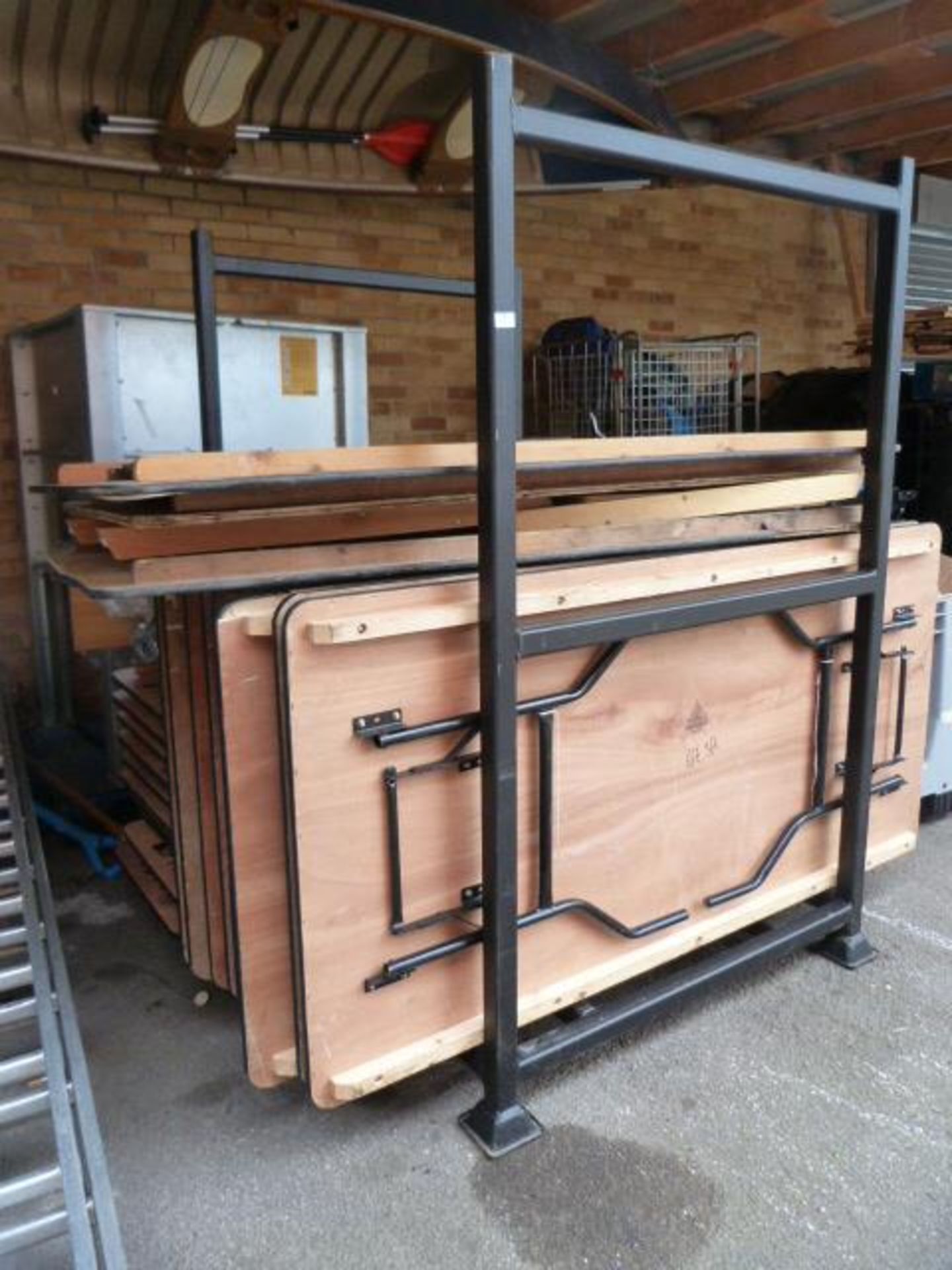 *Stillage Containing Ten 6ft x 2ft and Twelve 6ft x 3ft Banqueting Tables with Folding Legs