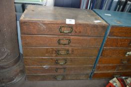 Six Drawer Oak cabinet Containing Gemstones and Rocks