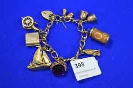 9k Gold Charm Bracelet with Assorted Charms ~36g gross