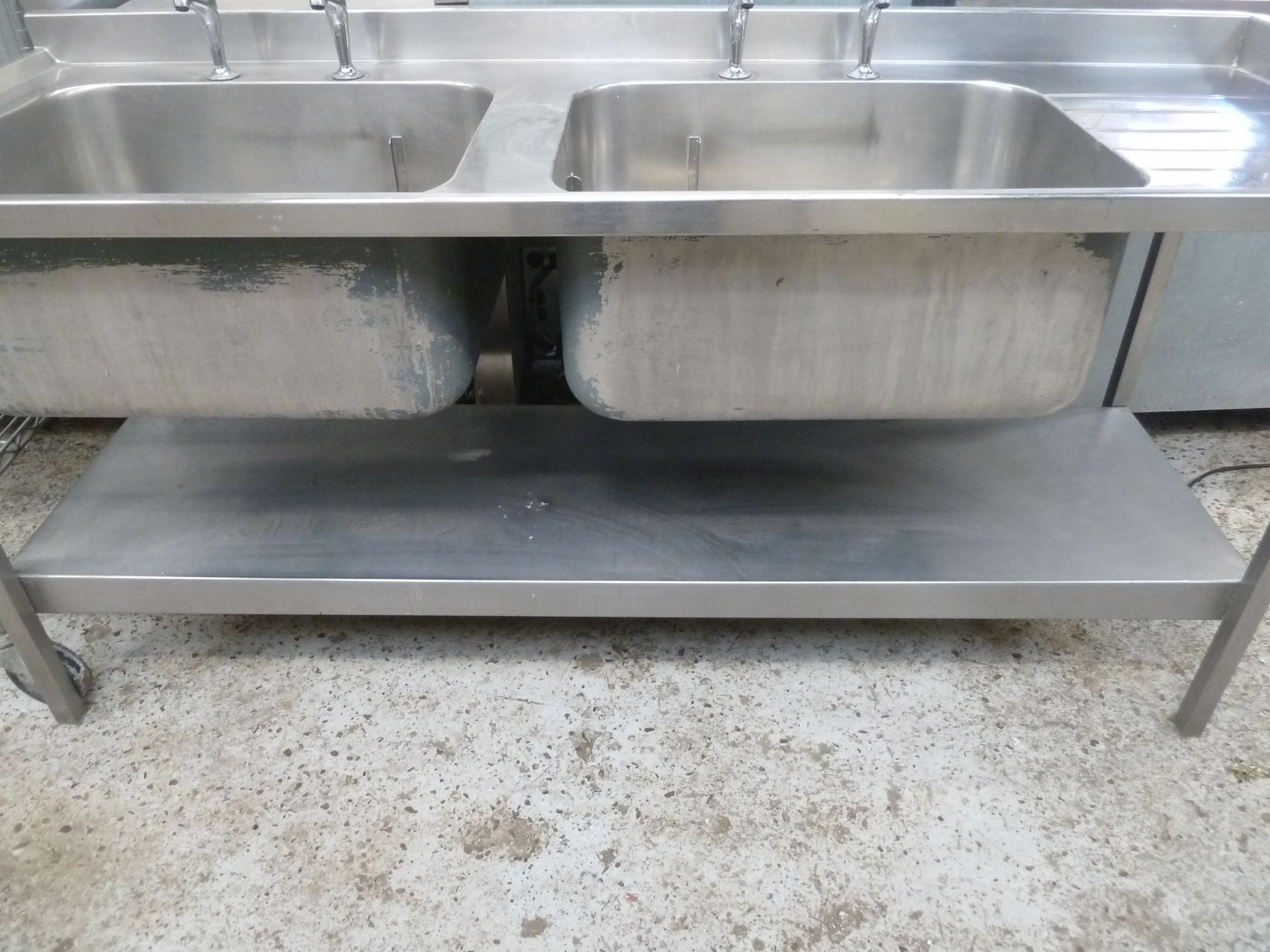 * S/S double bowl sink with small right hand draining board - complete with taps and undershelf. - Image 5 of 5