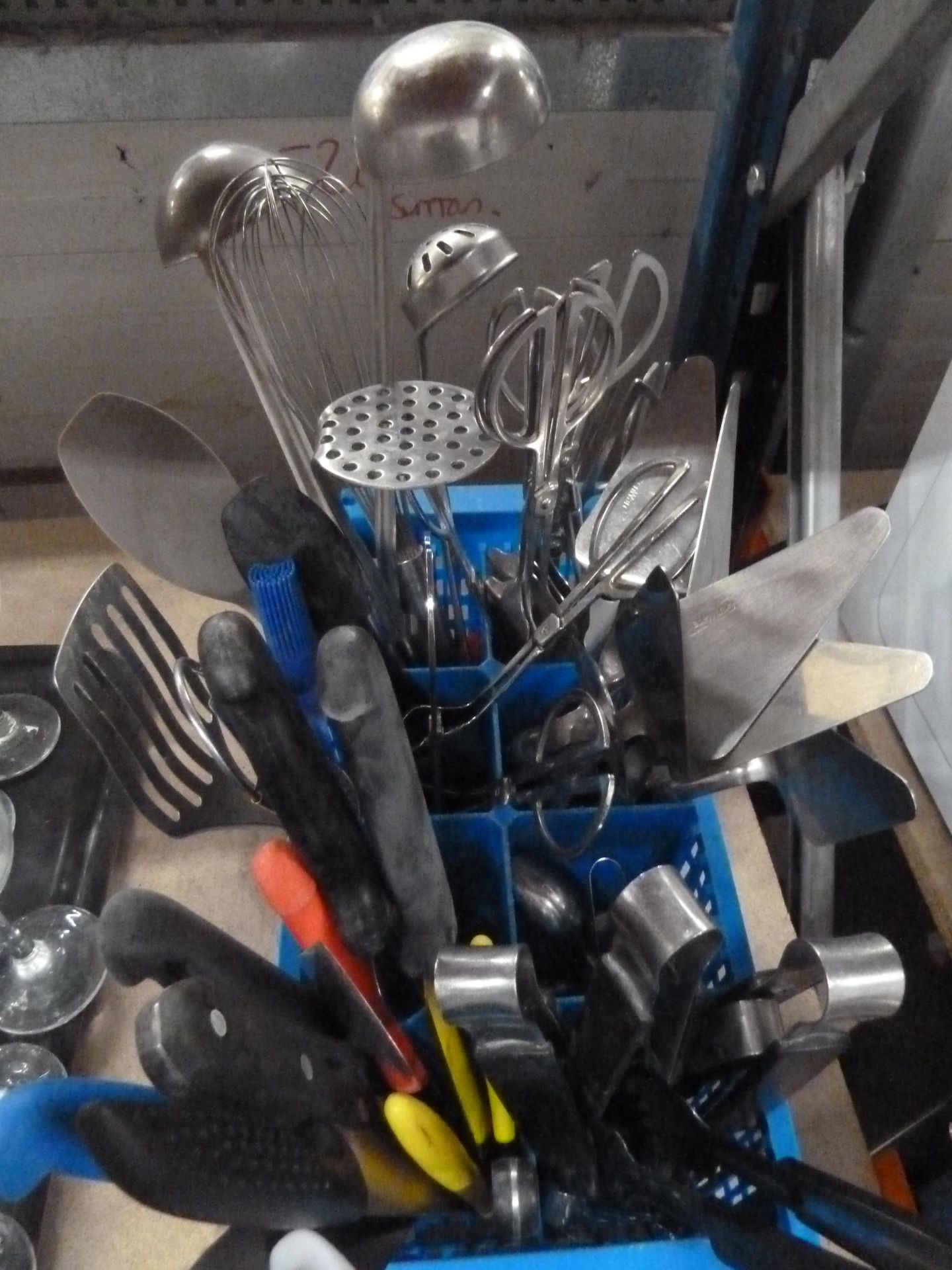 *large assortment of chefs knives and utensils