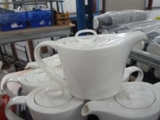 *7 x large white teapots