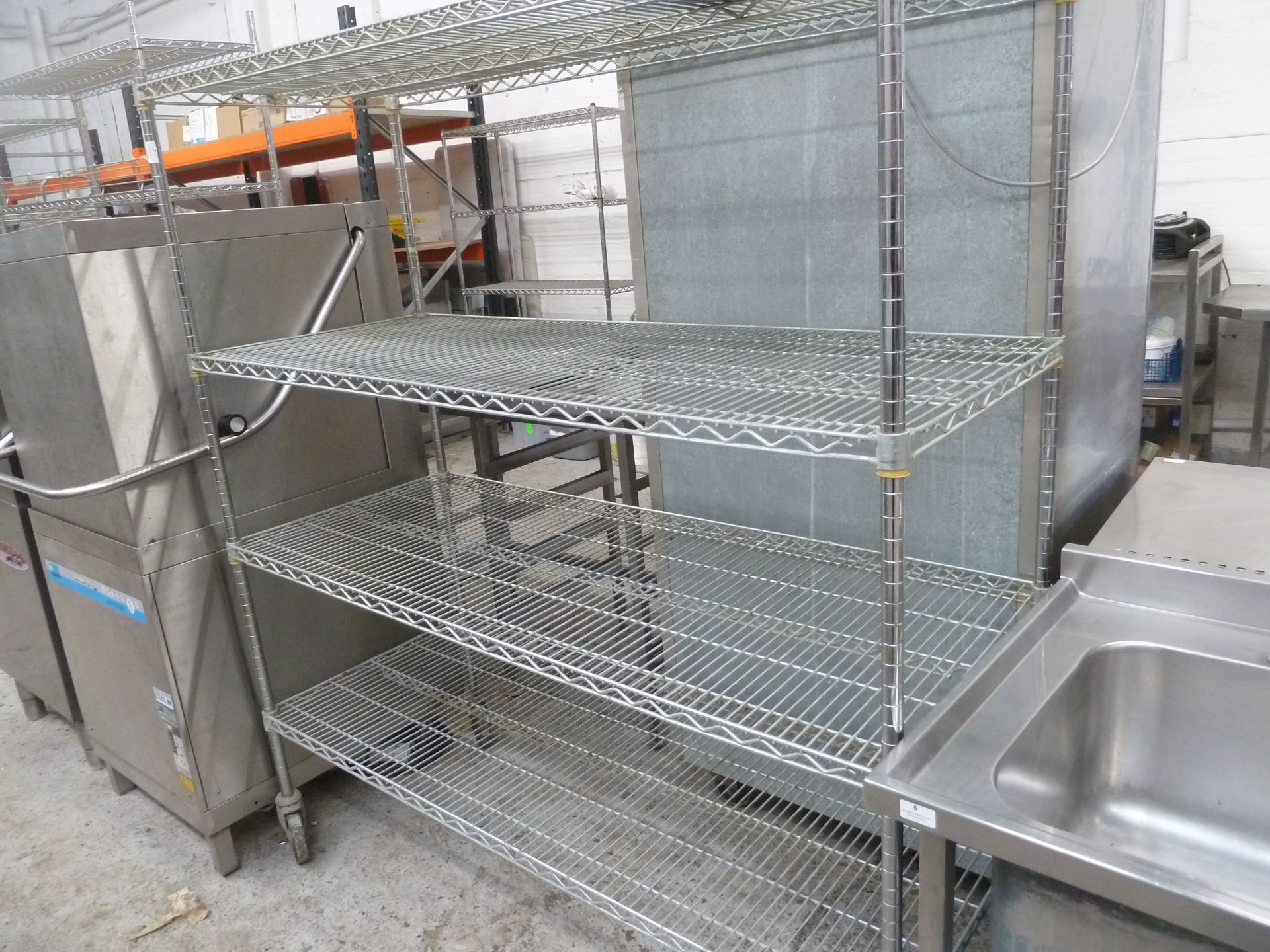 * 4 shelf wire racking on castors. 1500w x 610d x 1720h