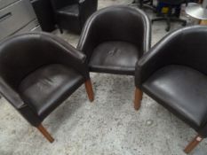 * 3 x brown leather tub chairs - long legs