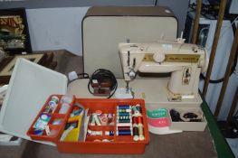 Vintage Singer Sewing Machine and Accessories