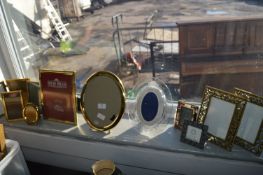 Ten Brass and Metal Photo Frames and One Glass