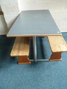 *grey topped table with 2 x wooden benches. Table 1200w x 600d x 700h. Benches - 1140w x 280d x 430h