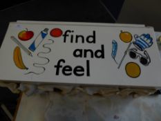 *find and feel' box with 4 compartments