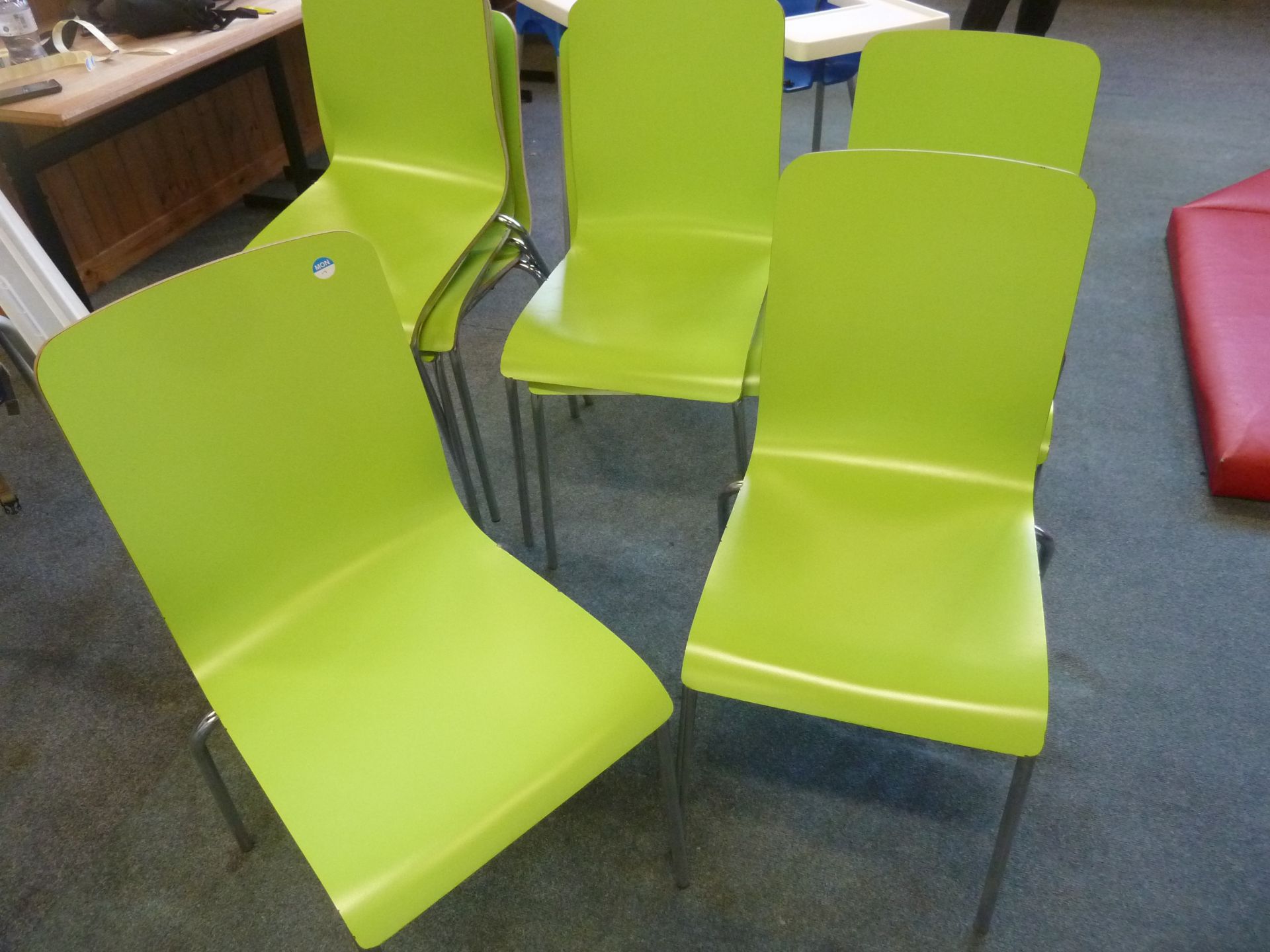 *8 x lime green stackable chairs with S/S legs