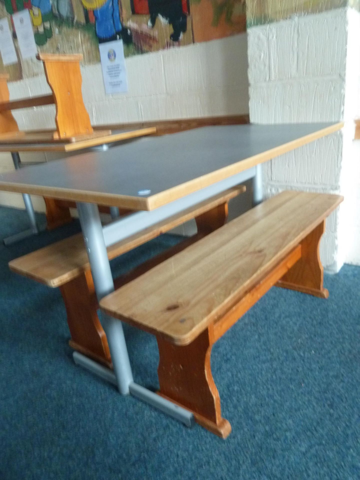 *grey topped table with 2 x wooden benches. Table 1200w x 600d x 700h. Benches - 1140w x 280d x 430h