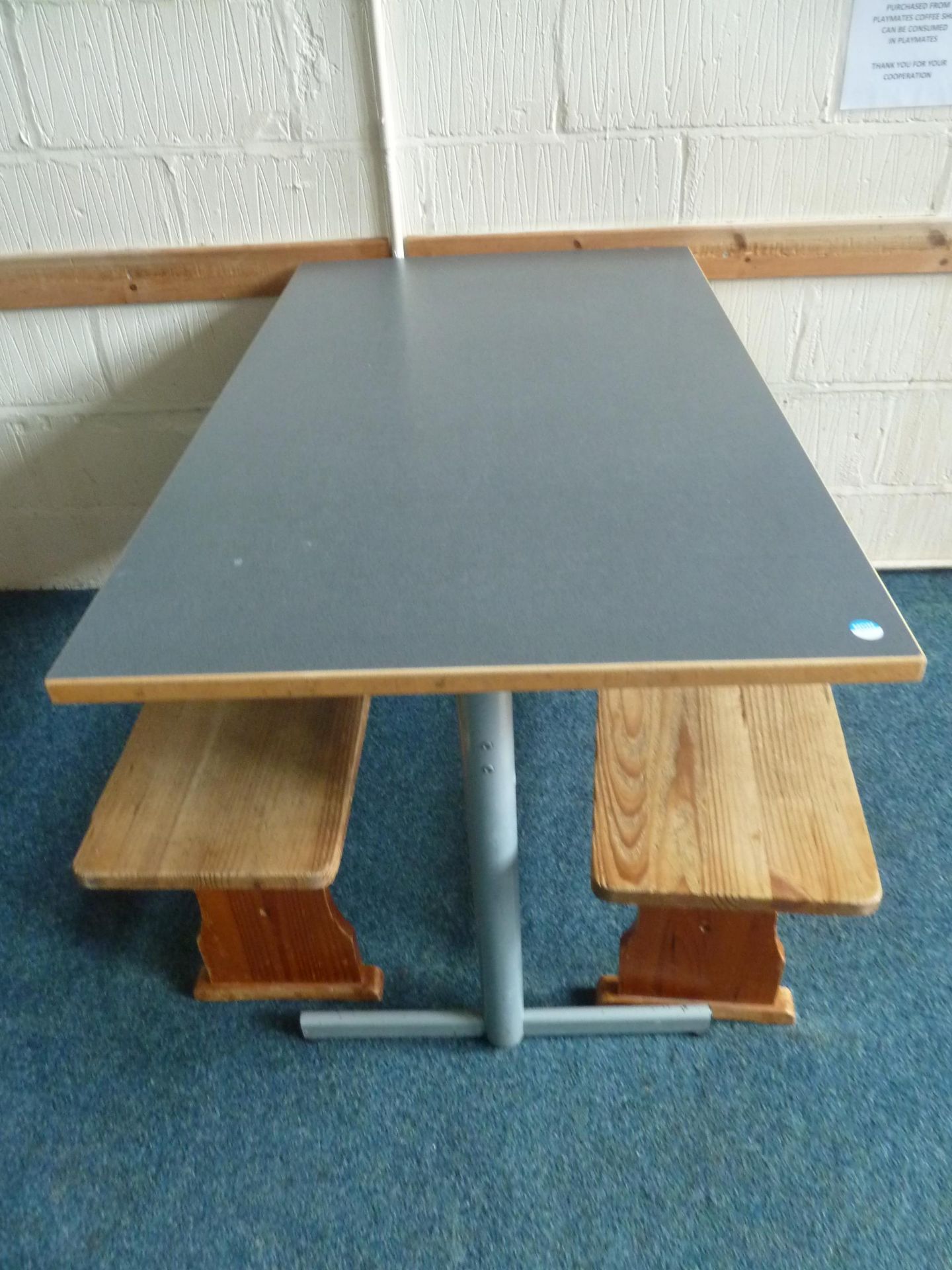 *grey topped table with 2 x wooden benches. Table 1200w x 600d x 700h. Benches - 1140w x 280d x 430h