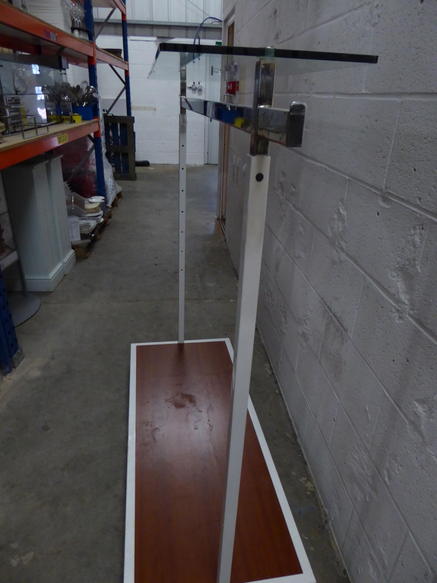 * metal rail with wood effect bottom shelf and glass over shelf on castors. Adjustable height. 1600w - Image 2 of 3