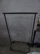* grey metal clothes rail on castors. 1130w x 550d x 1800h