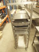 * 10 shelf S/S tray rack with trays on castors