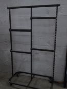 * grey metal clothes rail on castors with 4 adjustable half width rails. 1130w x 550d x 1800h