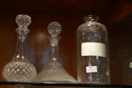 Two Decanters and a Large Jar